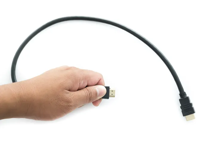 hand-holding-a-hdmi-cable-2026-01-11-10-33-28-utc 